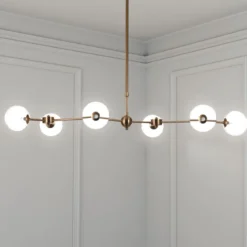 Alycia a lampadario in metallo verniciato ottone opaco e sfere in vetro bianco opaco 120x68 h90-150 cm