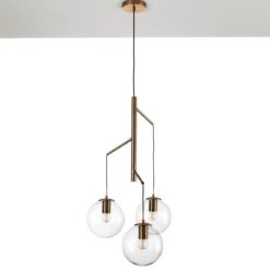 Alycia e lampadario in acciaio oro opaco e 3 sfere in vetro trasparente 115x10xh95-132 cm