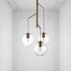 Alycia e lampadario in acciaio oro opaco e 3 sfere in vetro trasparente 115x10xh95-132 cm