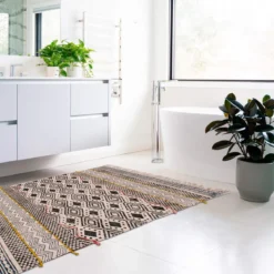 Nest tappeto bagno / scendiletto in cotone 100% con nappe grigio 110x60 cm